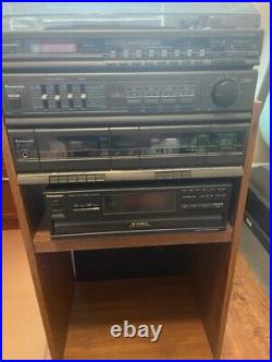 AM-FM stereo tuner Withturntable, Casette deck and compact 5 Disk Changer